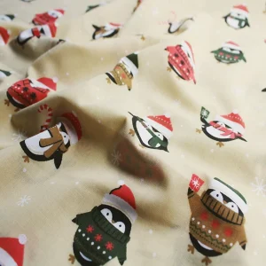 Christmas Polycotton - Penguins on Caramel
