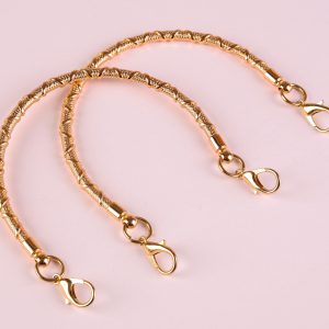 Pair of gold coloured small bag handles