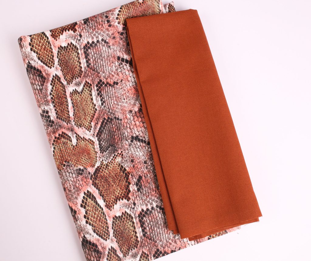 Perfect Pairs! 2 x Fat Quarter Pack - Pink Snake Laminate plus Tan Cotton